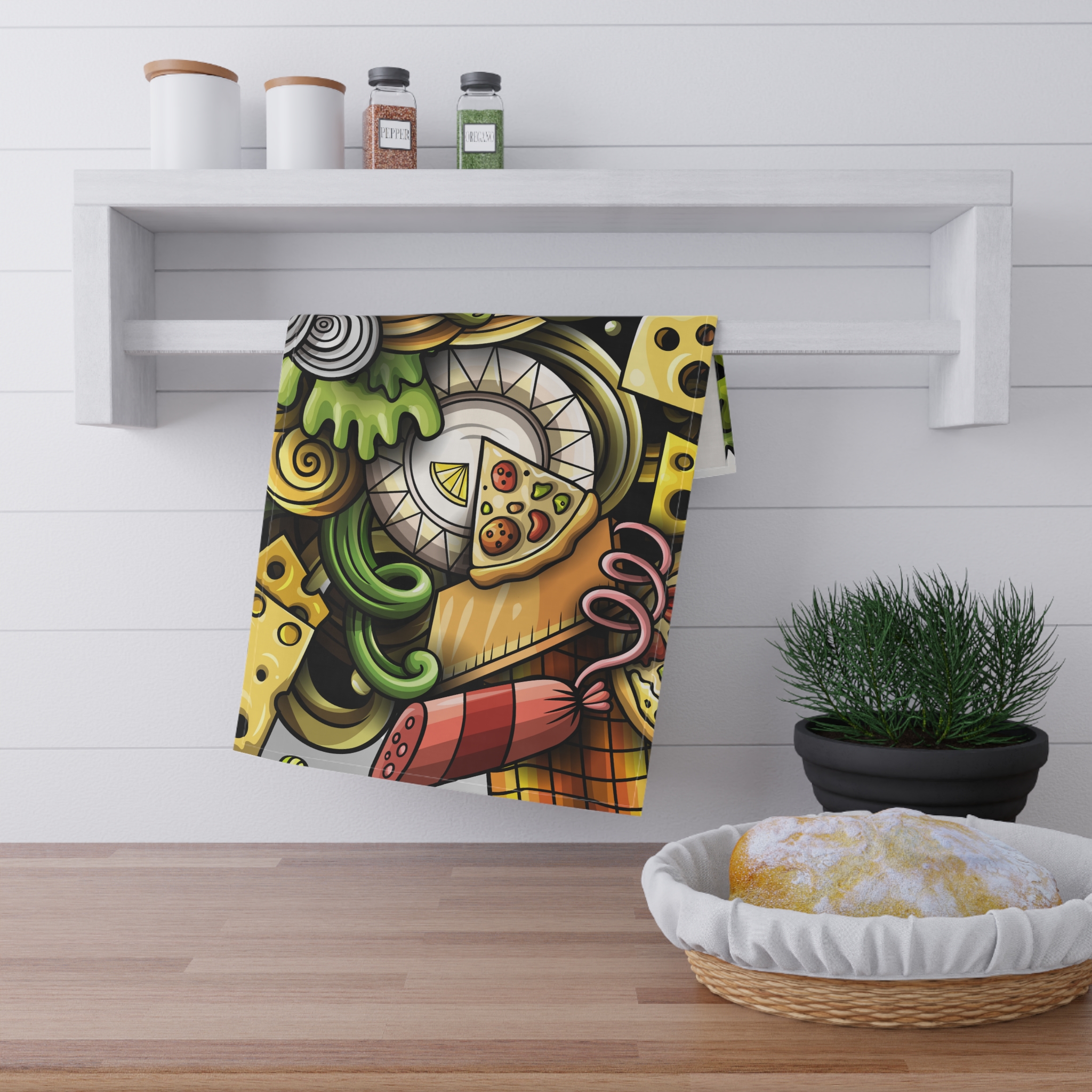 Colorful pizza-pattern tea towel hanging in a kitchen